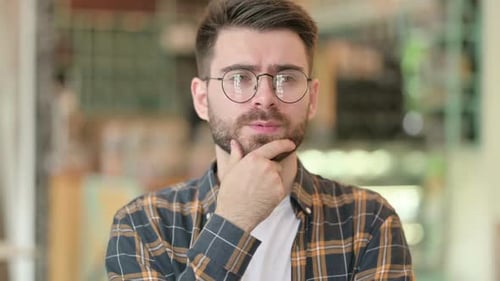 Young Adult Having an Idea