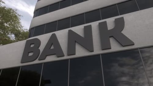 Bank Sign on a Modern Glass Skyscraper