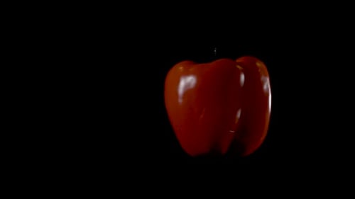 Rotating Red Bell Pepper on Black Background