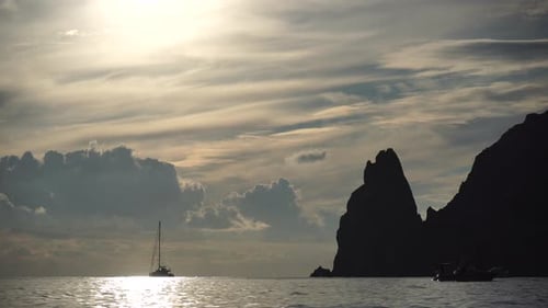 Sea Landscape with Rocky Coastline on Sunset Time