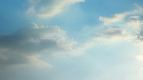 Time Lapse of Fluffy White Clouds in Blue Sky