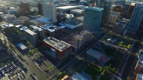 Panning wide aerial of the downtown blocks in Phoenix, Arizona.