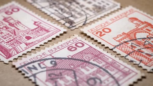 Macro Footage of Vintage German Postage Stamps