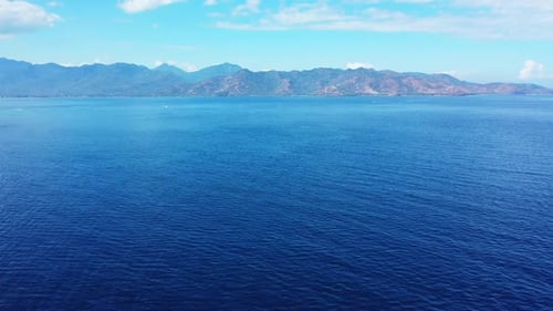 Aerial drone view texture of tropical sea view beach holiday by blue ocean with white sandy backgrou