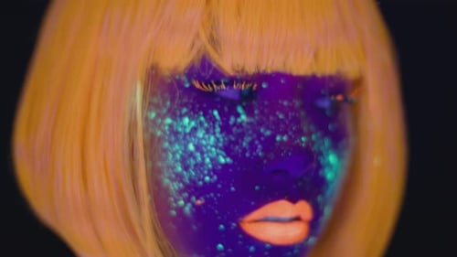 Woman's Face with Intricate UV Paint Design