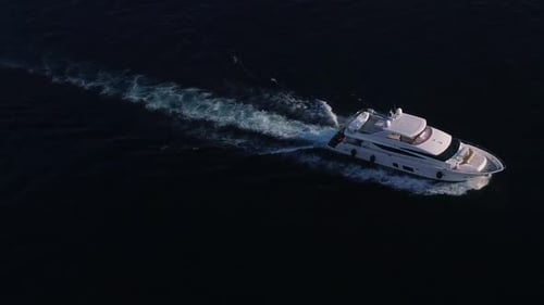 White Luxury Yacht Sails on the Ocean