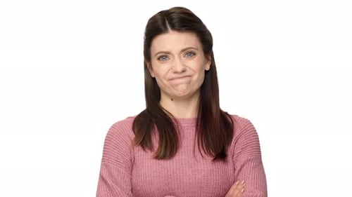 Portrait of Outraged Woman with Brown Hair Shaking Head and Expressing Disagreement Isolated on