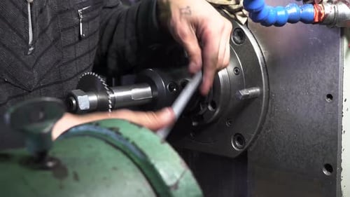 Mechanic repairman at the factory