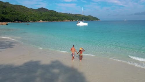 Praslin Seychelles Tropical Island with Withe Beaches and Palm Trees Couple Men and Women Mid Age on