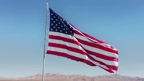 Waving American Flag on a Sunny Day in Desert