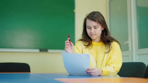 Serious schoolgirl in middle school