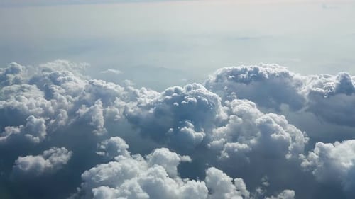 Majestic Clouds Drifting Across the Sky From Above