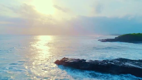 Golden Coastline Waves at Sunrise or Sunset