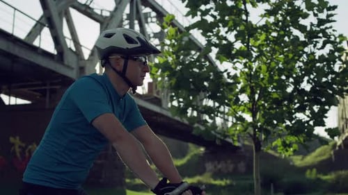 Rides Around the City and Park Professional Cyclist