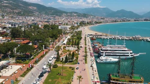 Awesome aerial view of tourist ships in Alanya Marina, Turkey. Drone flying over the ships. Alanya i