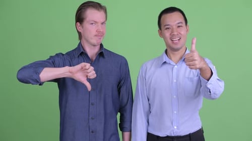 Men Disagreeing Thumbs Up and Thumbs Down