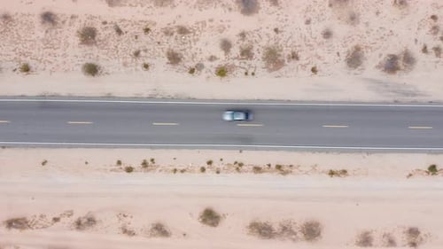 Desert road. Aerial point of view over road in desert.