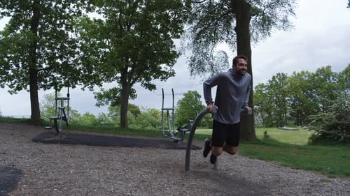 Athlete Performing Triceps Dips On Outdoor Gym