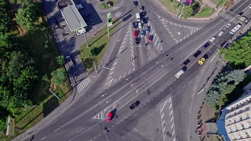 Crossroads and Many Vehicles Driving the Road
