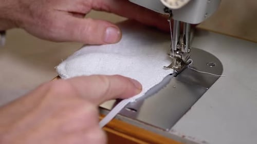 Sewing Machine Making White Cloth Product