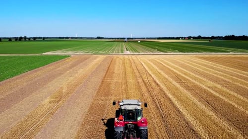 Harvesting Machinetractor Working in the Field