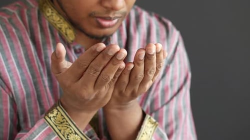 Muslim Man Keep Hand in Praying Gestures During Ramadan Close Up