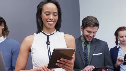 Group of executives using laptop and digital tablet 4k
