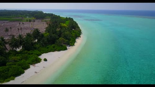 Aerial drone shot texture of luxury resort beach adventure by blue lagoon with white sandy backgroun