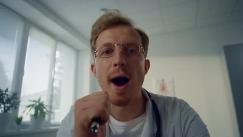 Friendly Doctor Examination with Light, Close Up Shot