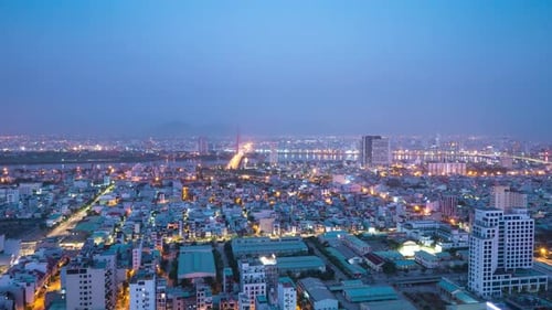 Beautiful Timelapse View of City Lights and Buildings From Night Time to Daytime