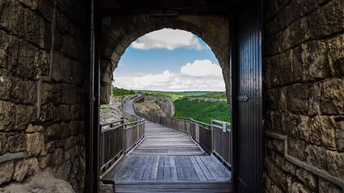Time lapse with moving clouds over the medieval fortress