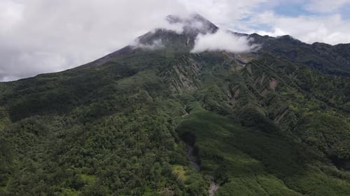 Aerial view of active Merapi mountain with clear sky in Indonesia