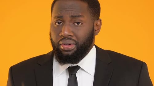 Man in Suit Talking Close Up Portrait