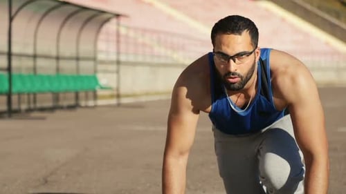 Man Gets Ready To Start Jogging