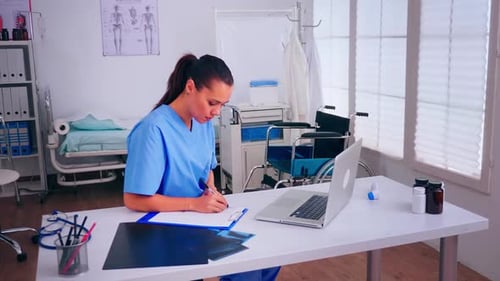 Woman Doctor Working in Hospital Room