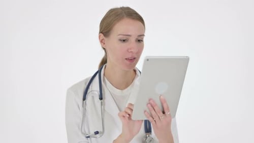 Woman Doctor Using Tablet Device in Clinic
