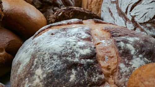 Artisanal Breads Loaves Piled Close Up
