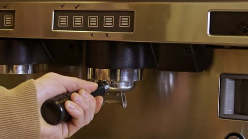 Placing Portafilter into Espresso Machine