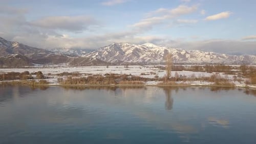 Coastline with Mountains on Background