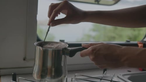 Close up Making coffee process in pot inside motor home RV campervan