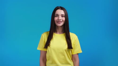 Woman Smiling Portrait in Studio Setting