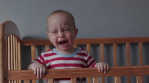 Infant Crying in Crib, Close-Up