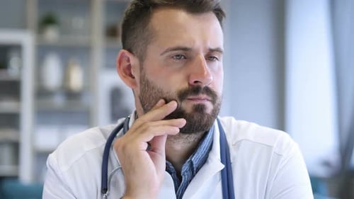 Pensive Doctor Thinking about Patient Health