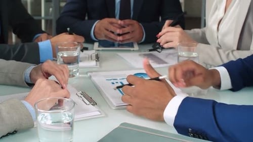 Business People Meeting at Office Discussing Data