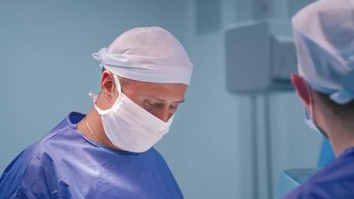Surgeons in Hospital Operating Room, Close Up