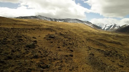 Mountain Landscape in Front of the Foot of a Snowcapped Peak