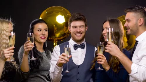 Friends Celebrating a Birthday with Champagne Toast