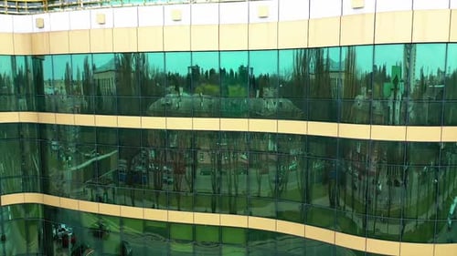 Modern office building detail. Bottom view of modern skyscrapers in business district against city