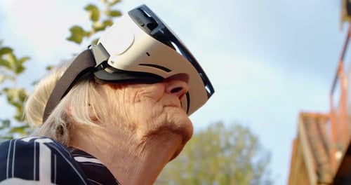 Senior Woman Wearing Virtual Reality Headset