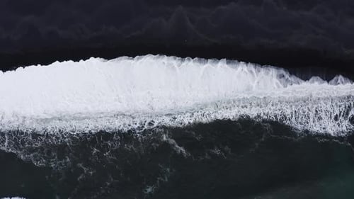 Drone View Of White Tide On Black Sand Beach